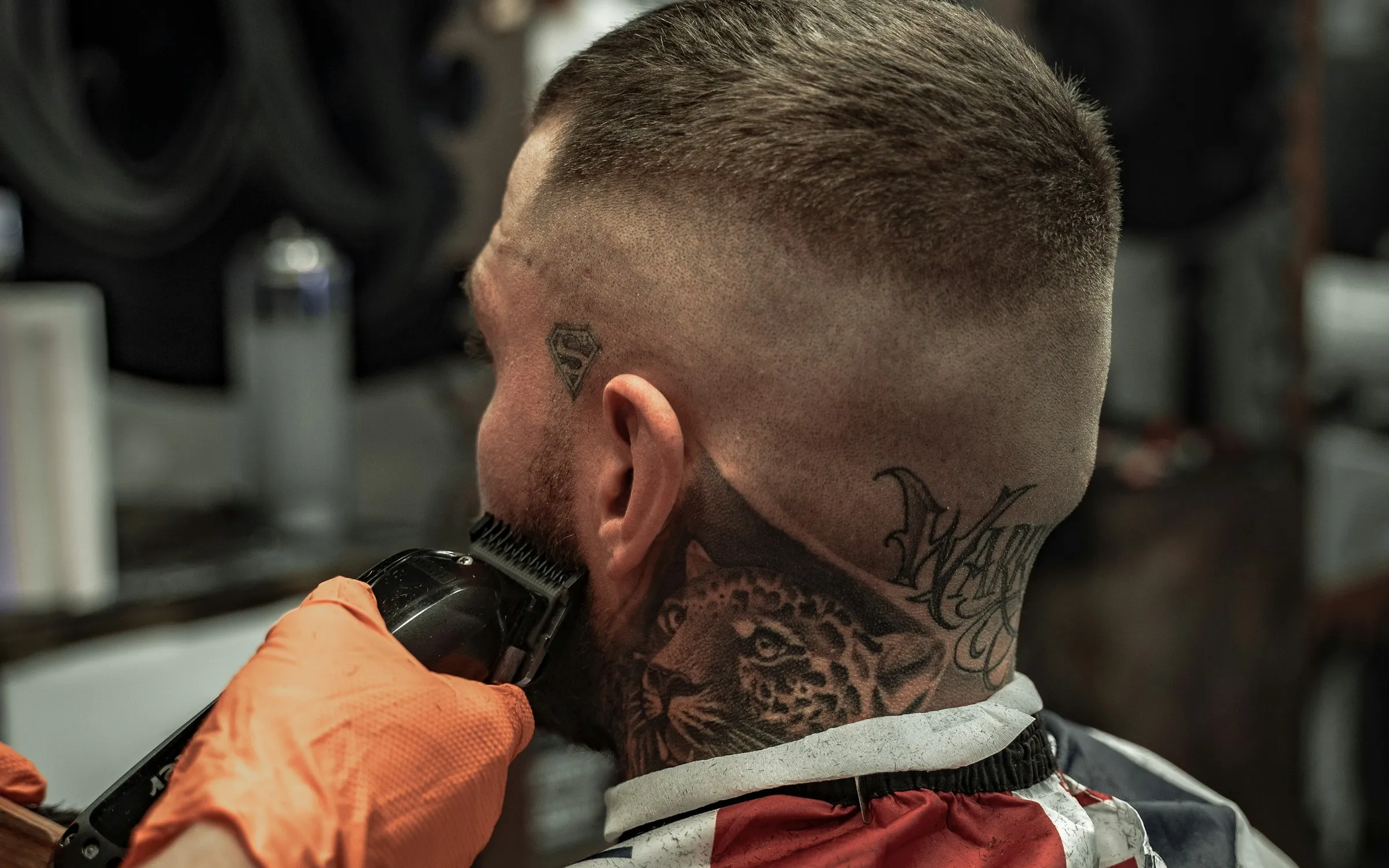 A Fadeline barber working a fade